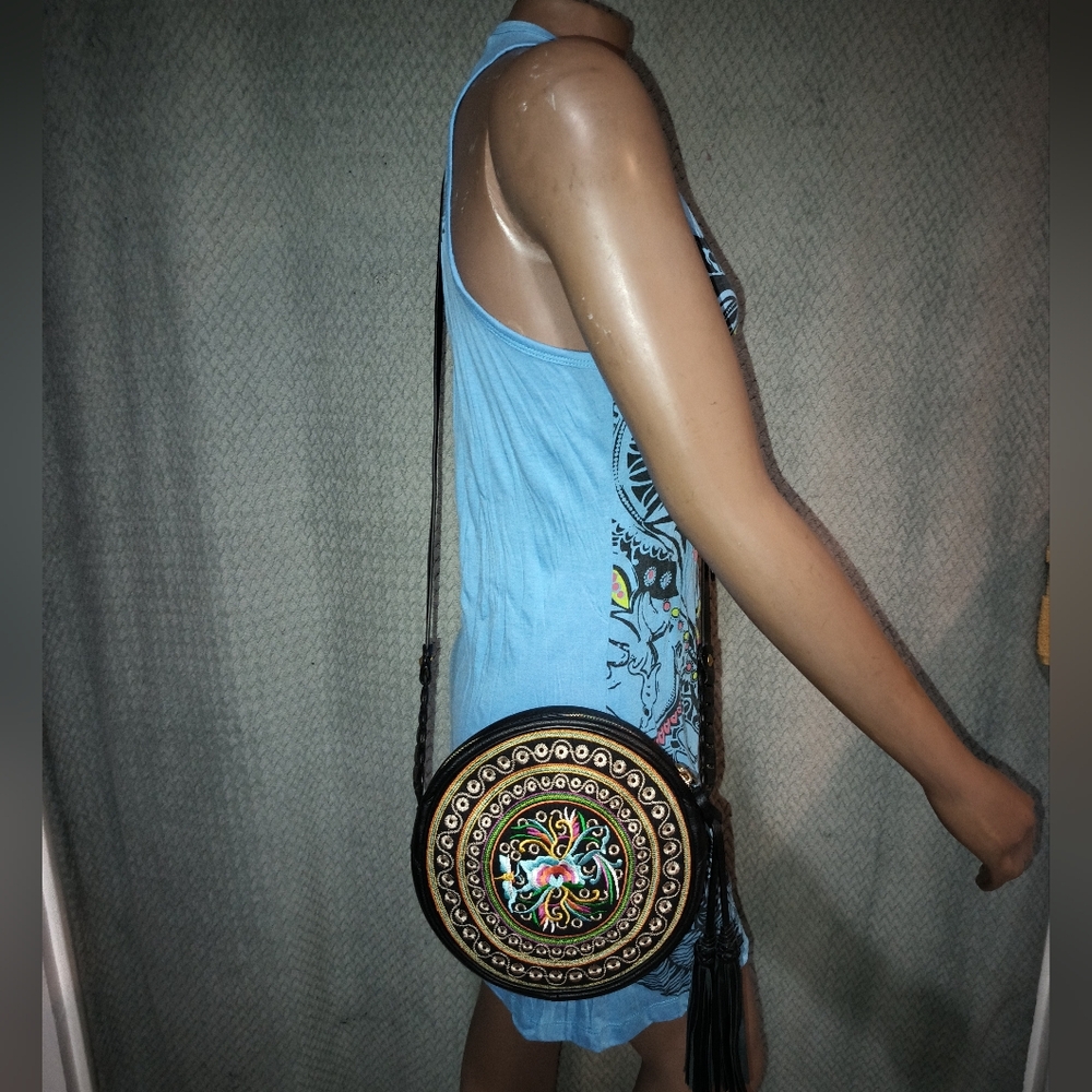 Oryany Black Leather Floral Embroidery Round Canteen Crossbody Bag.
